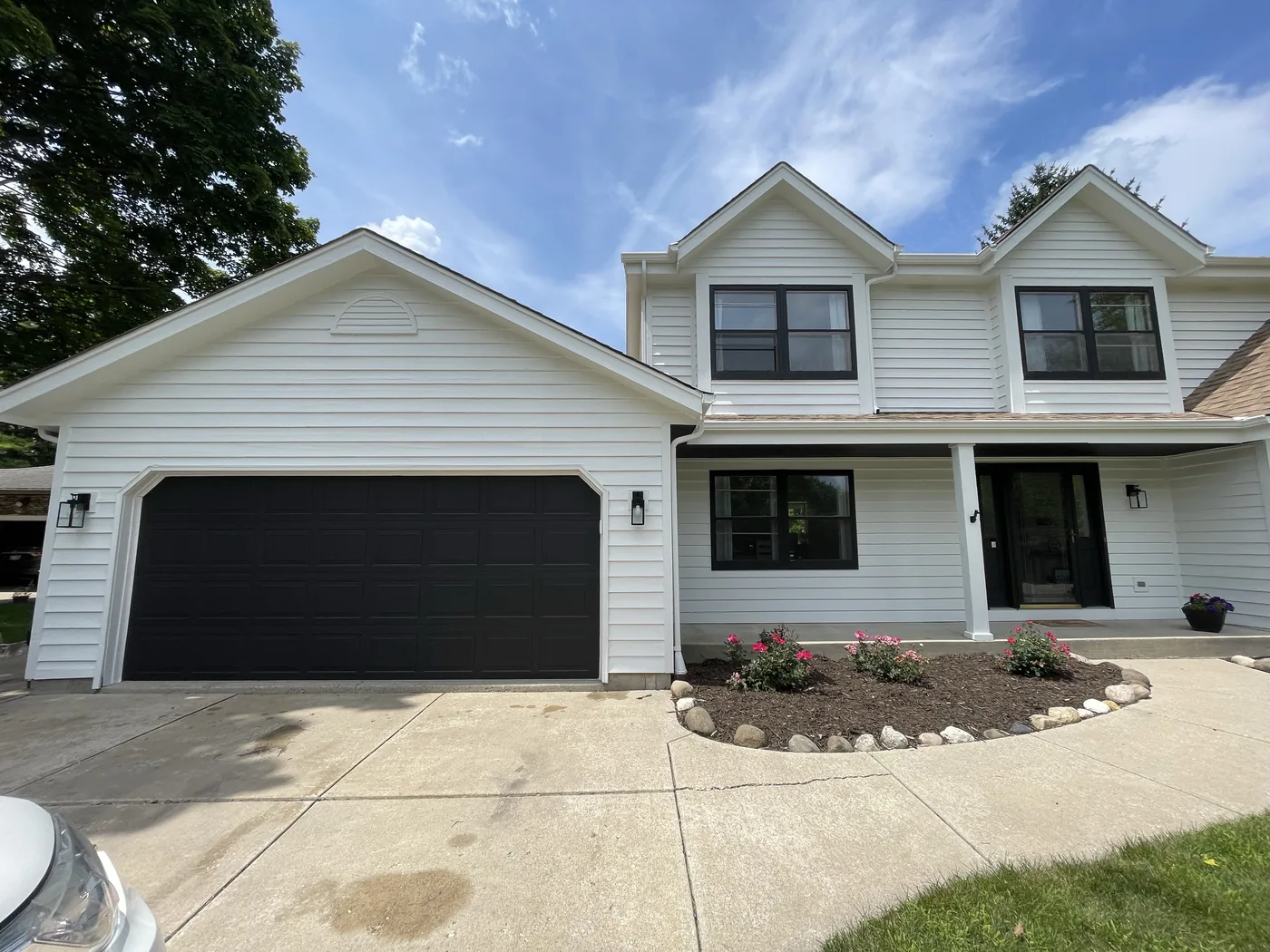 Finished driveway and front exterior after repaint