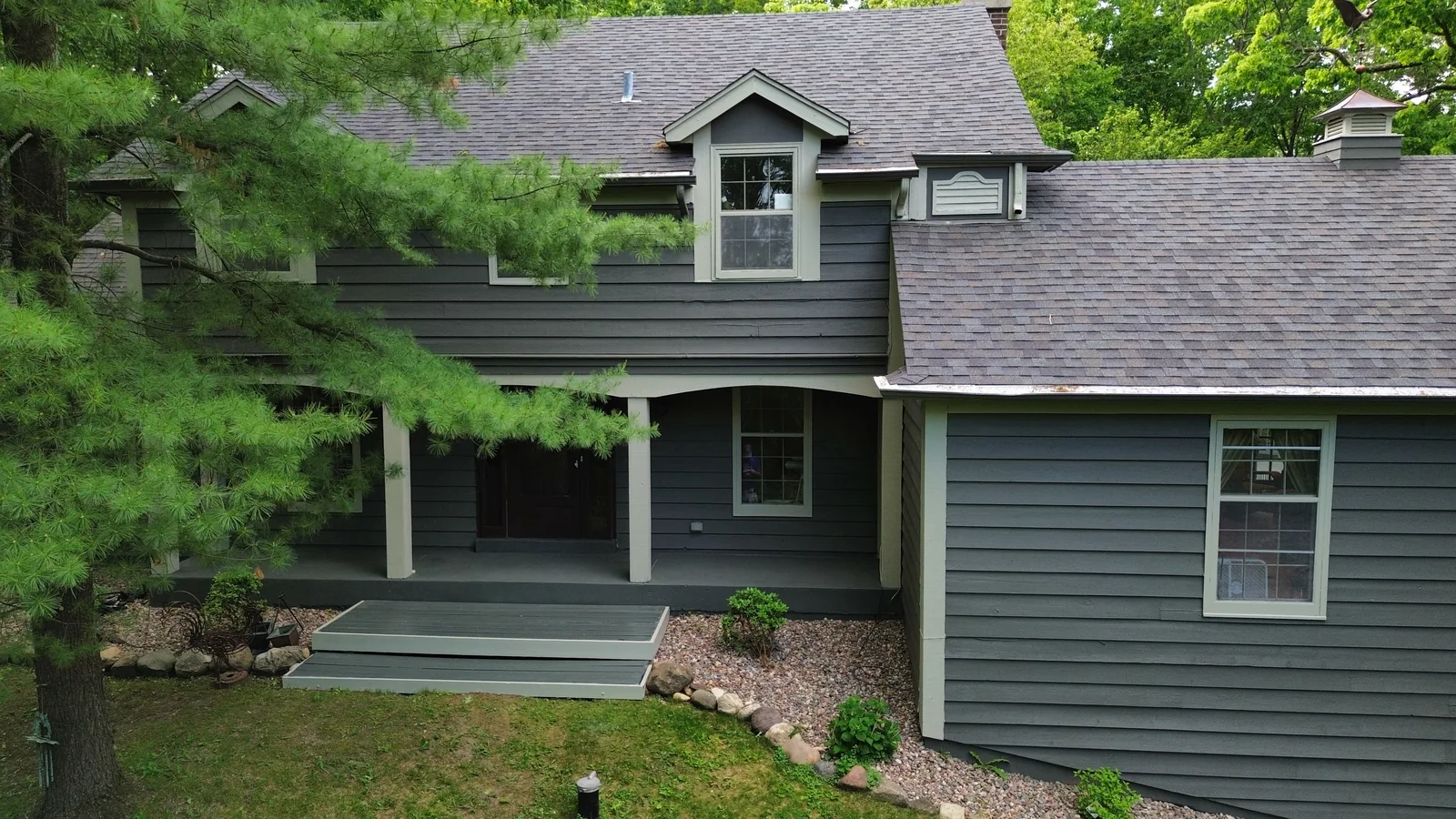 Finished exterior repaint from aerial view