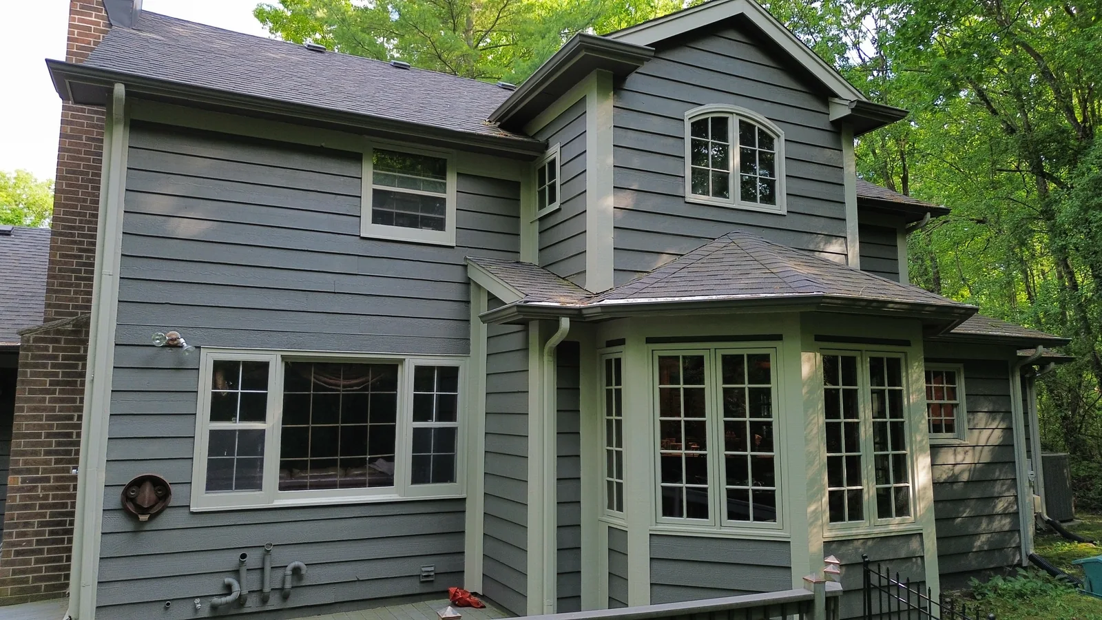 Finished exterior repaint with trim from aerial view